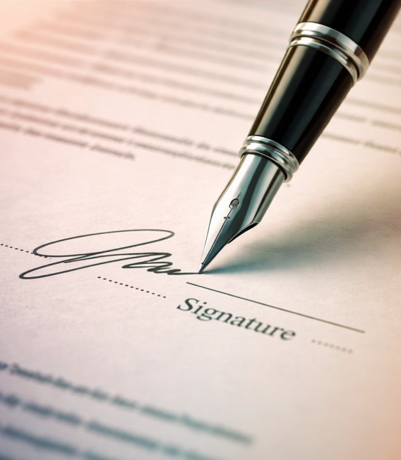 Fountain pen signing a contract